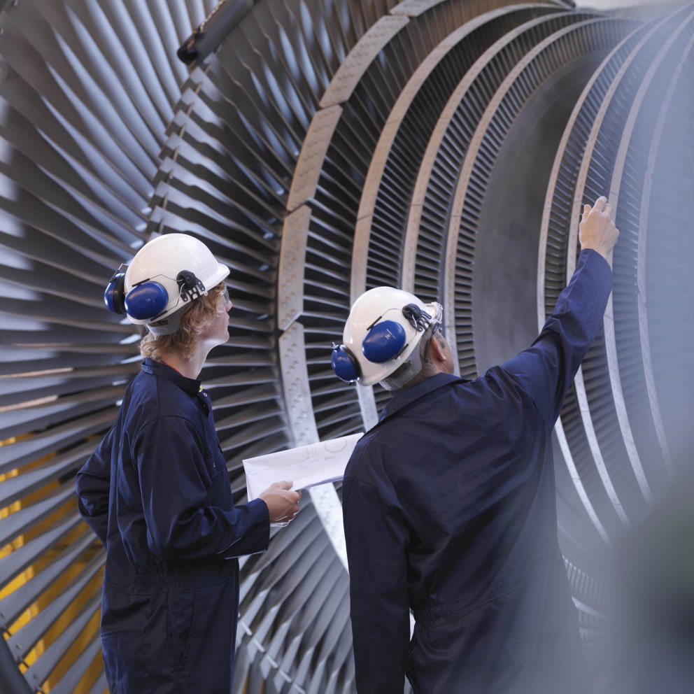 Intersafe two men looking at turbine